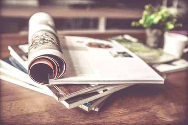 Stacks of Newspapers and Magazines  - hoarder sign