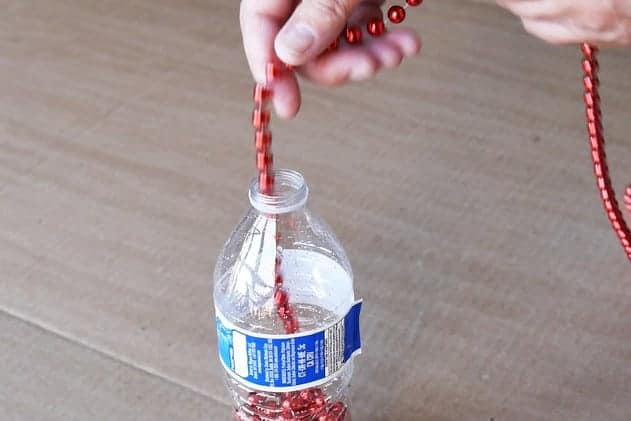 Store wreaths in water bottles