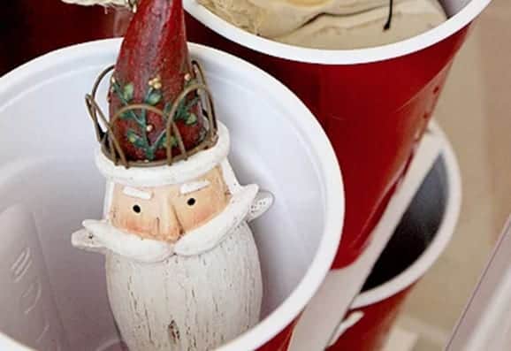 Use a plastic cup to separate the decorations