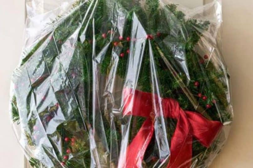 Hang your wreath in a garbage bag