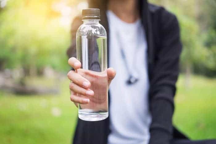 Store wreaths in water bottles