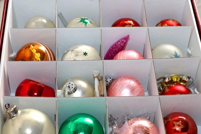 Use old Christmas cards and boxes as decorative dividers