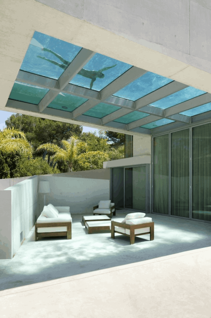Transparent swimming pool on the terrace in Mind-Blowing Architectural Designs