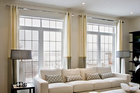 Hang curtains higher to make your windows appear bigger