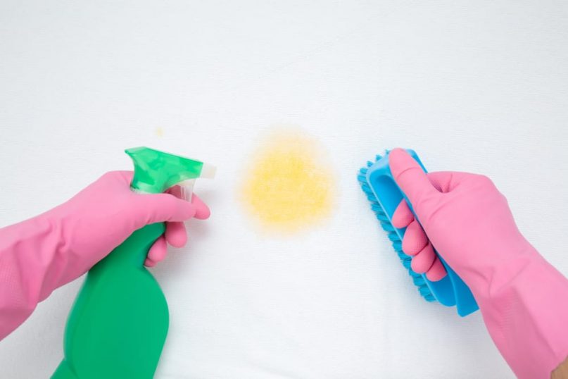 Using a stain remover, clean the affected area