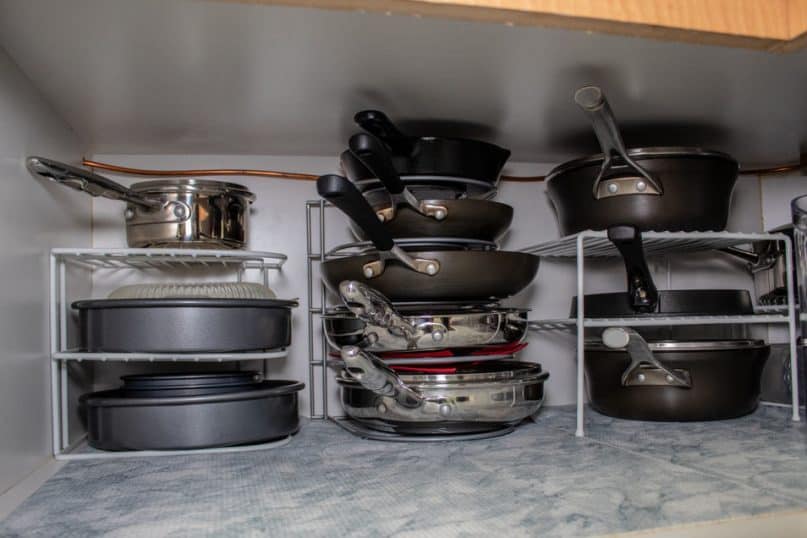 Use Wire Shelf Inserts in the Cabinets to Stack Pots, Pans, and Lids