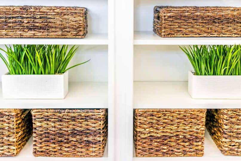 Store products in storage bins inside cabinets and pantries