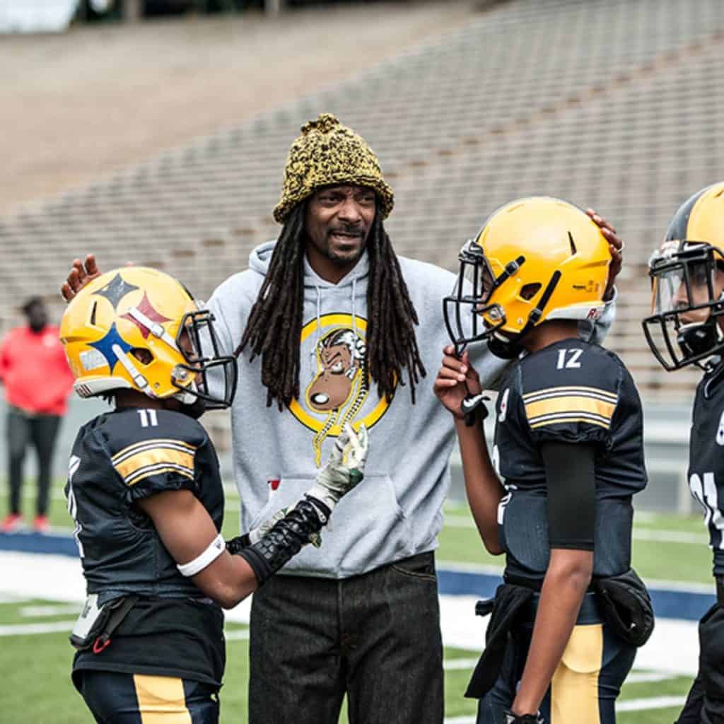 Snoop Dogg is a football coach.
